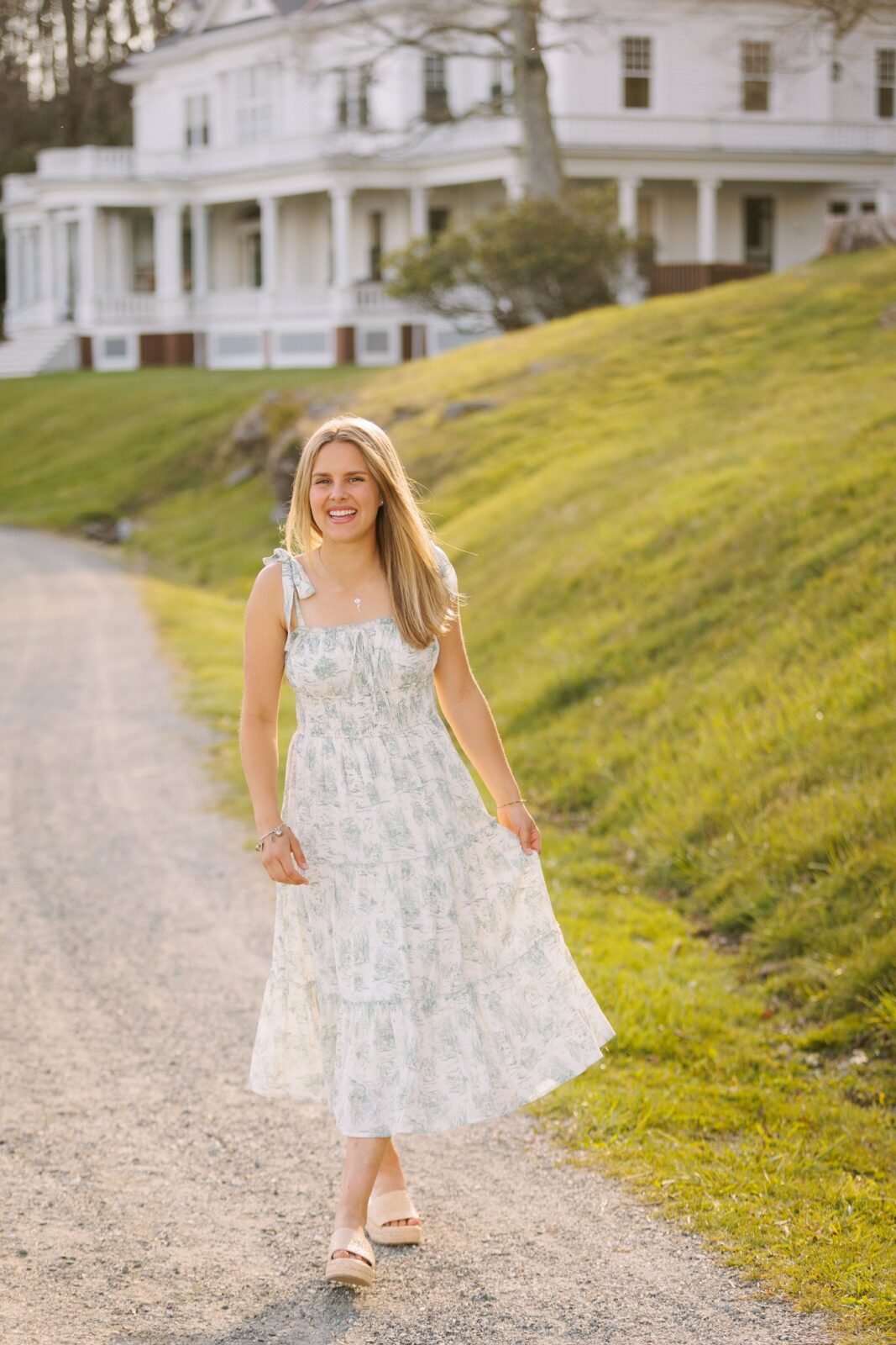 Senior girl posing at Moses Cone Manor House in Blowing Rock NC